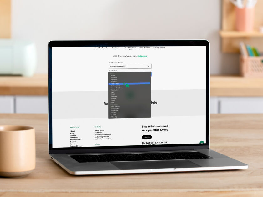 Cricut Explore 3 smart cutting machine cutting blue vinyl